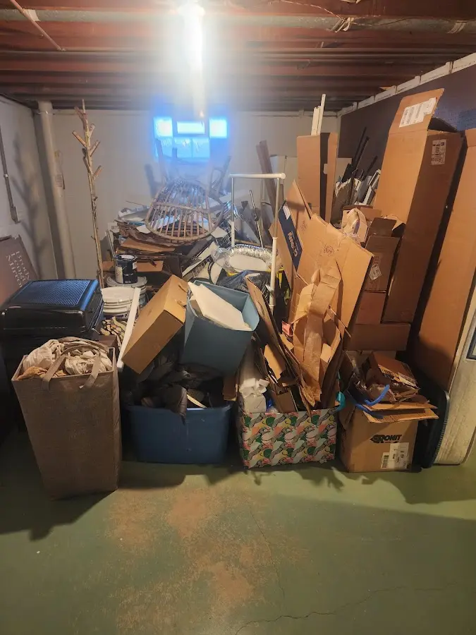 Roll-off dumpster container at job site for Yard Waste Dumpster Rental in Oak Park